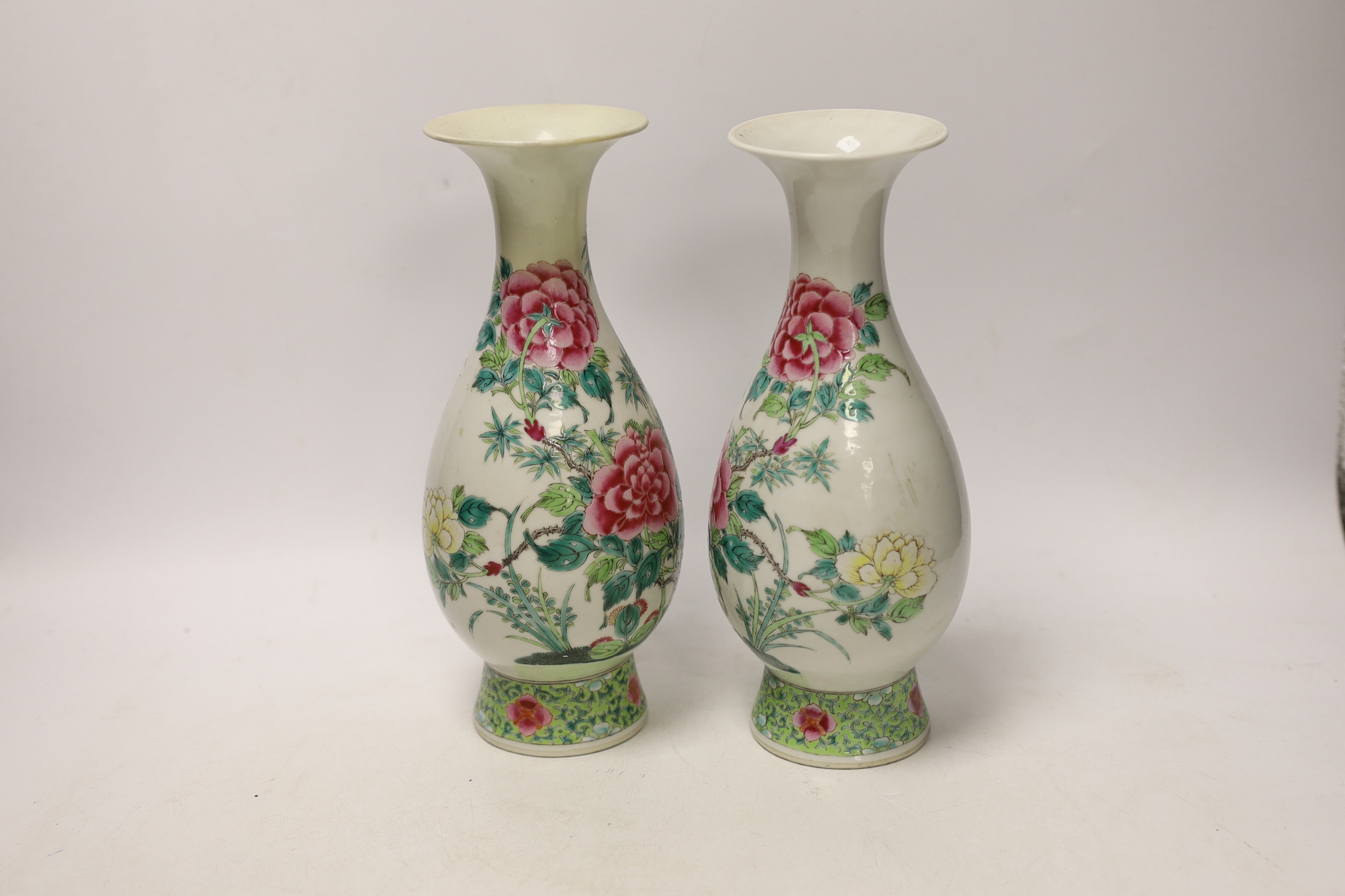 A pair of Chinese famille rose pear shaped vases, Guangxu period, 25cm high